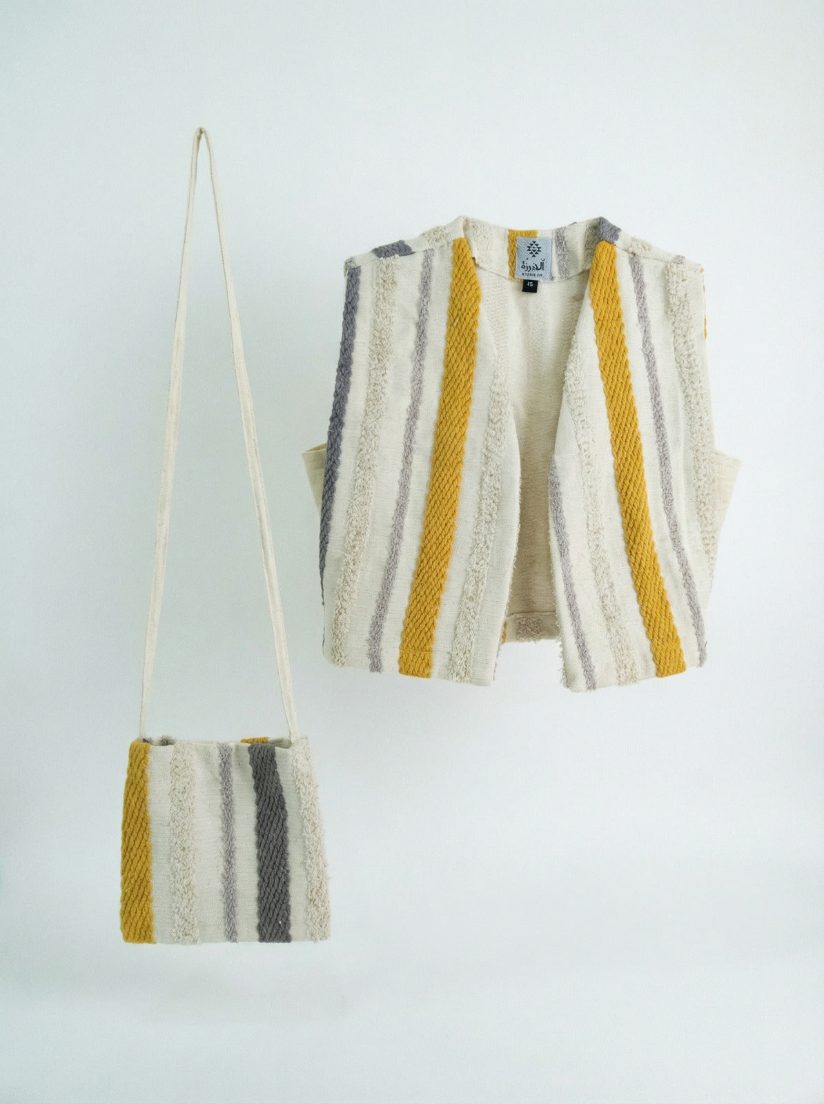 Boys’ Beige and White Gergean Vest With Bag