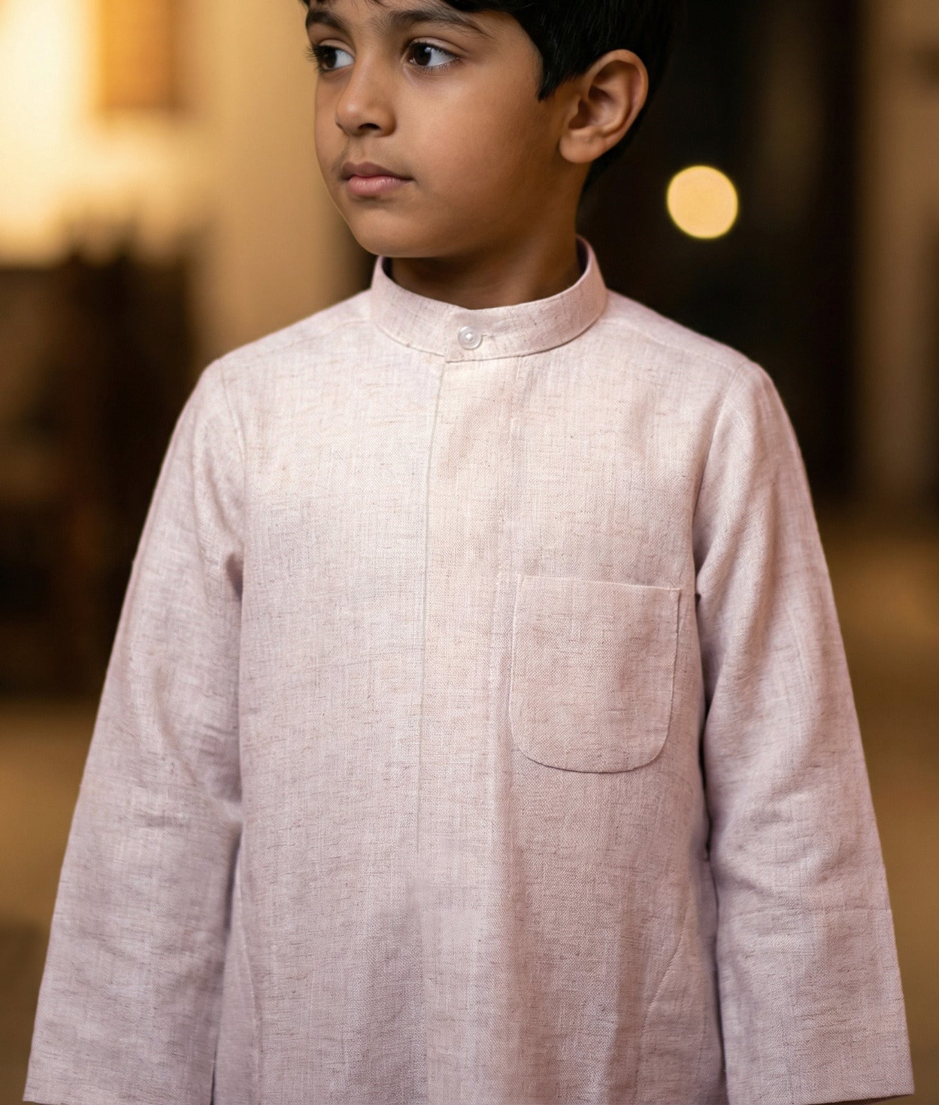 دشداشة الكتان للأطفال من الجزيرة بتصميم كلاسيكي