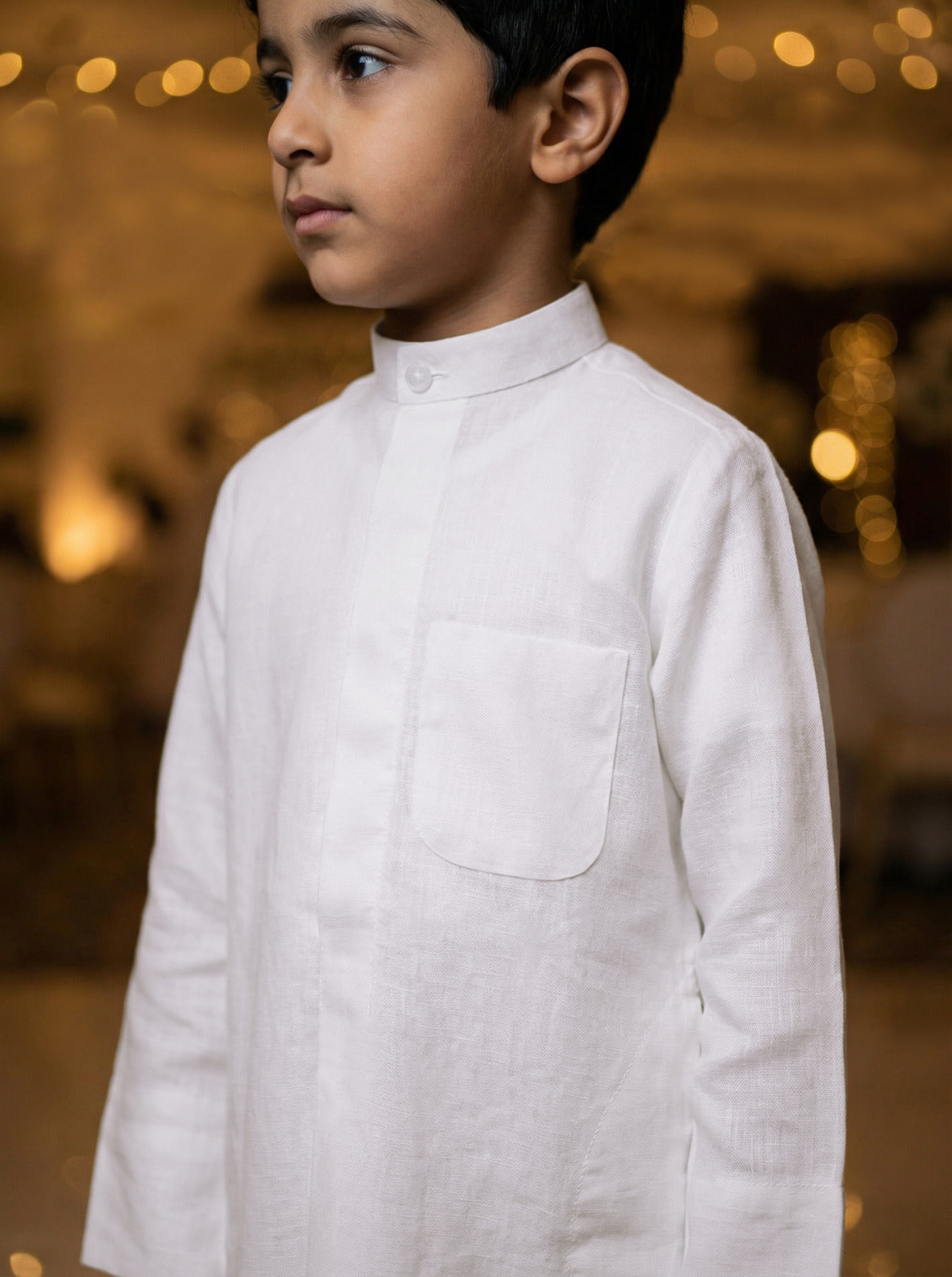 دشداشة الكتان للأطفال من الجزيرة بتصميم كلاسيكي