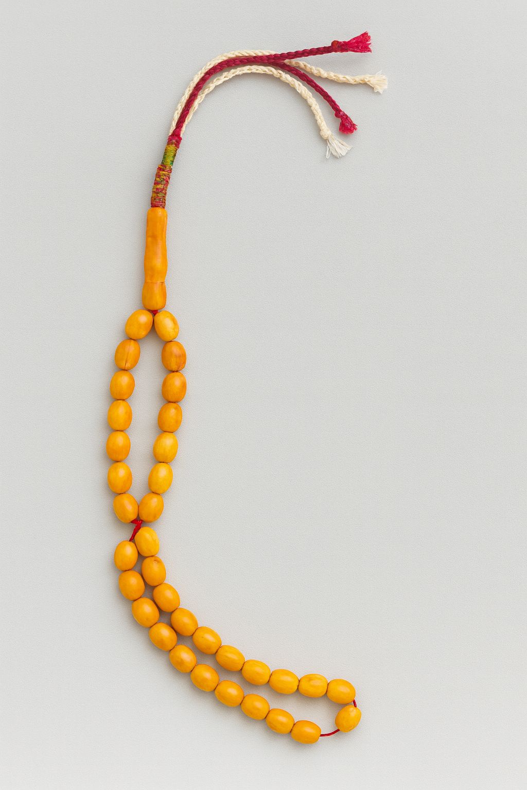 Yellow Misbah with White Karkoosha by Al Jazeera