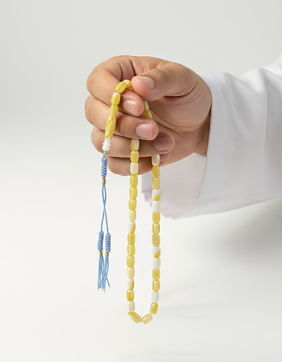 Yellow Misbah with Blue Karkoosha by Al Jazeera