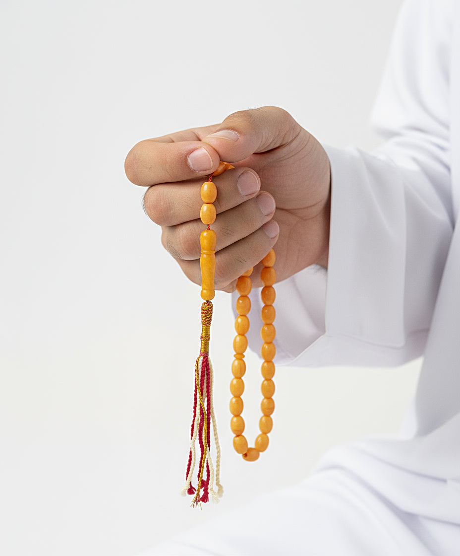 Yellow Misbah with White Karkoosha by Al Jazeera